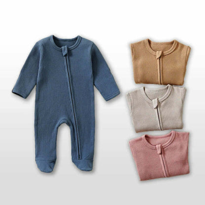 100% organic cotton baby romper in pastel colors with long sleeves and footed design, perfect for newborns aged 0-12 months