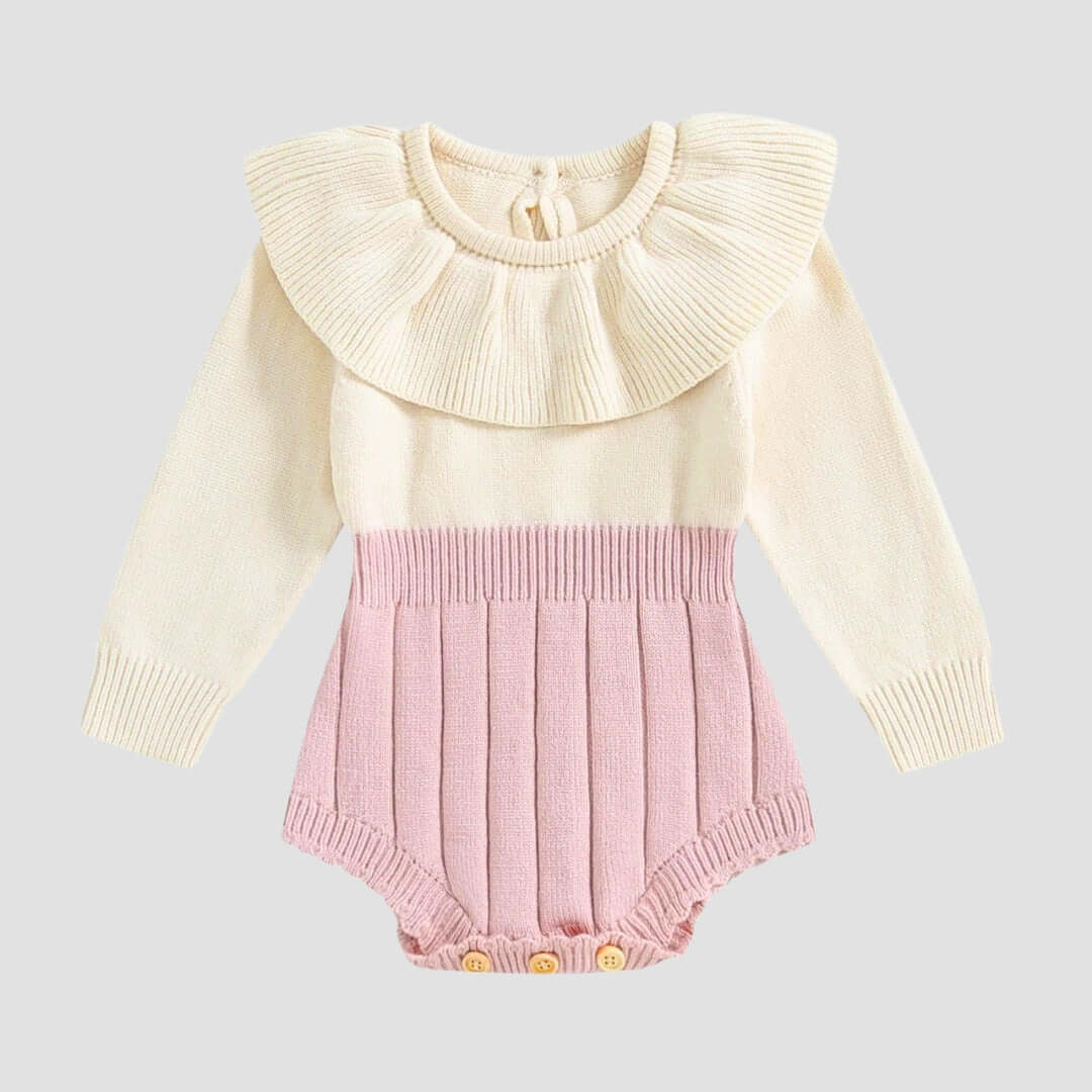 Adorable knit romper with ruffled collar in pink and cream, perfect for festive fall and winter celebrations for babies.