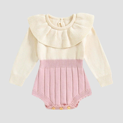 Adorable knit romper with ruffled collar in pink and cream, perfect for festive fall and winter celebrations for babies.