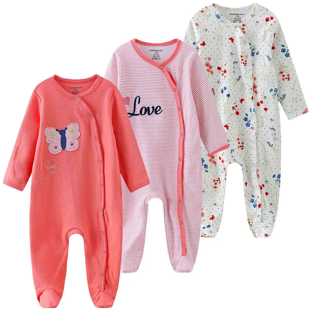 3 pack baby organic cotton pajamas in orange, striped, and floral designs with long sleeves and footed bottoms for ultimate comfort