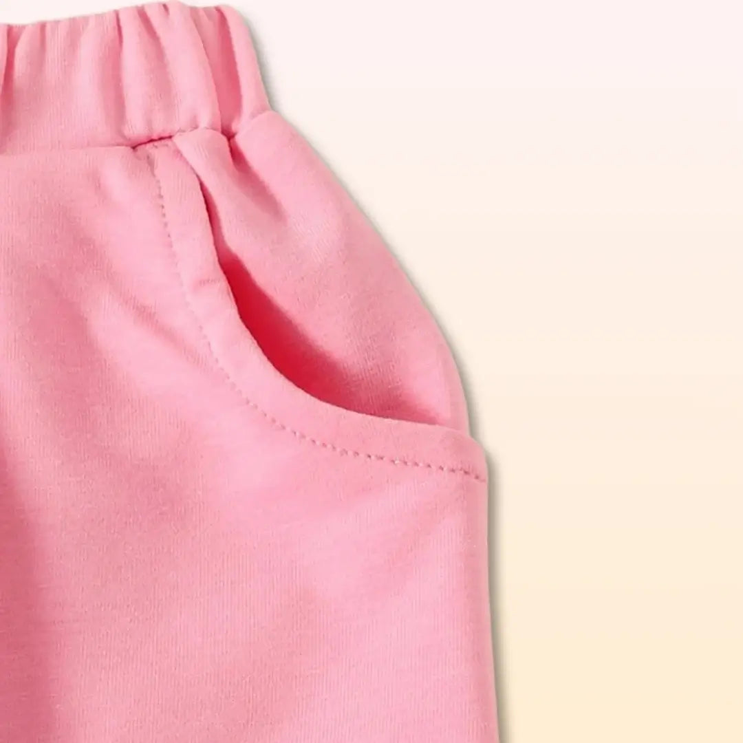 Close-up of pink toddler trousers with pocket detail, part of Daddy's Girl Sweatshirt and Trouser Duo for ages 0-3T.