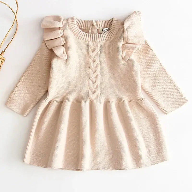 Beige autumn knit dress with ruffle shoulders, cozy and stylish for kids. Perfect for fall outings and family gatherings. 🍂