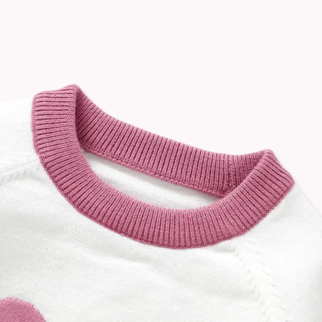 Close-up of Berry Bear Cozy Knit Sweater pink collar, featuring soft breathable fabric for baby comfort and style.