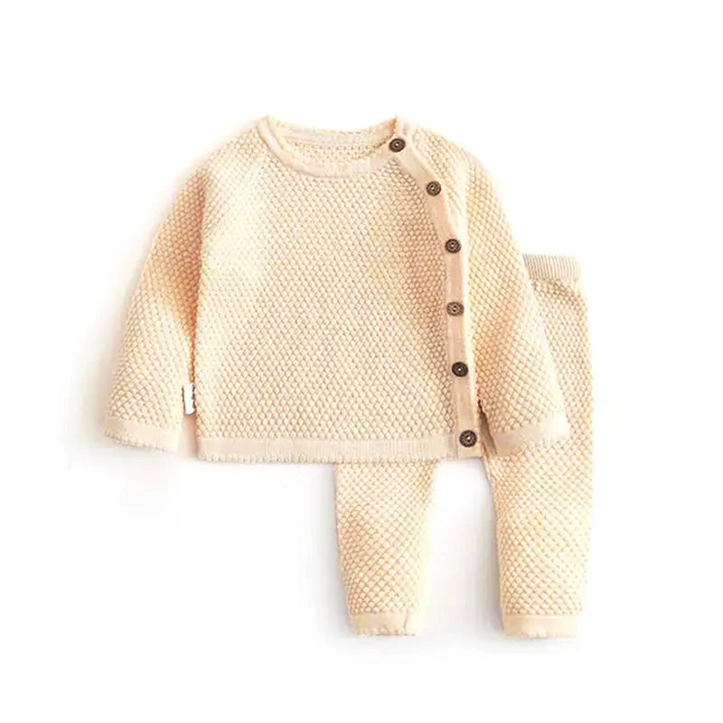 Luxe Comfort Knit Two Piece Set for Babies (6M-3T) in Soft Beige, featuring a cozy top with buttons and matching pants, perfect for chilly days.