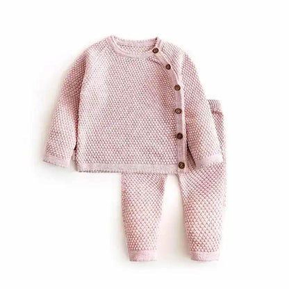 Luxe Comfort Knit Collection two-piece set for babies, pink knitted top and pants.