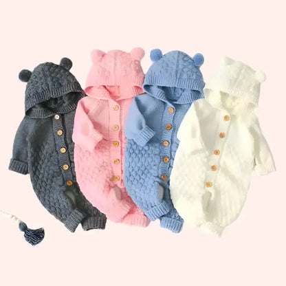 Cuddle Bear Knit Romper for Babies in grey, pink, blue, and cream with bear ears and hood, perfect for keeping newborns cozy.