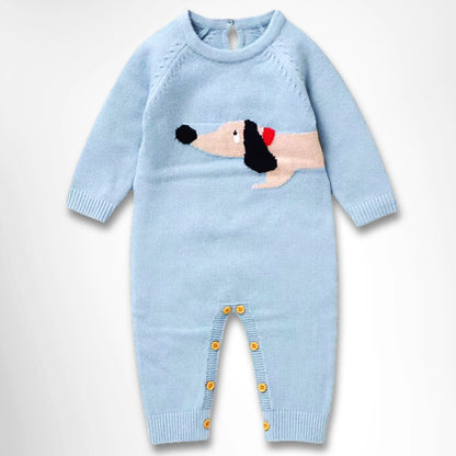 Cozy blue knit romper for babies with an adorable dachshund design, long sleeves, and leg buttons for easy changes. Perfect for winter warmth.