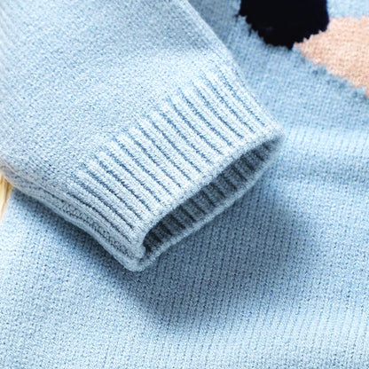 Close-up of soft blue knit fabric from the Dapper Dachshund Romper, featuring detailed ribbed cuffs for style and warmth.