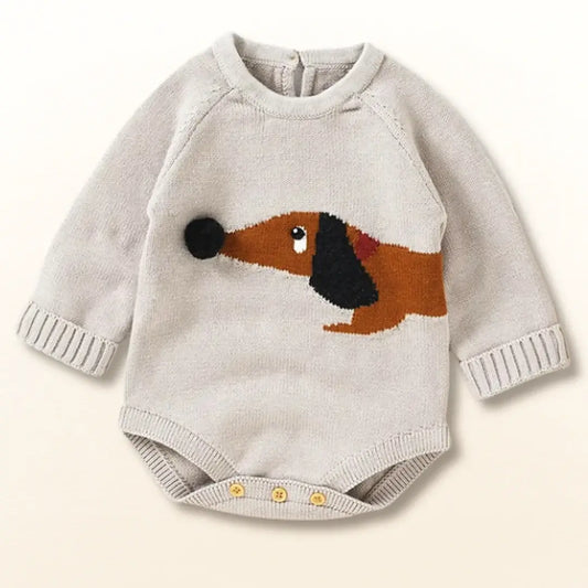 Cute knit romper with dachshund design for babies, featuring soft cotton fabric and easy-change buttons, perfect for chilly days.