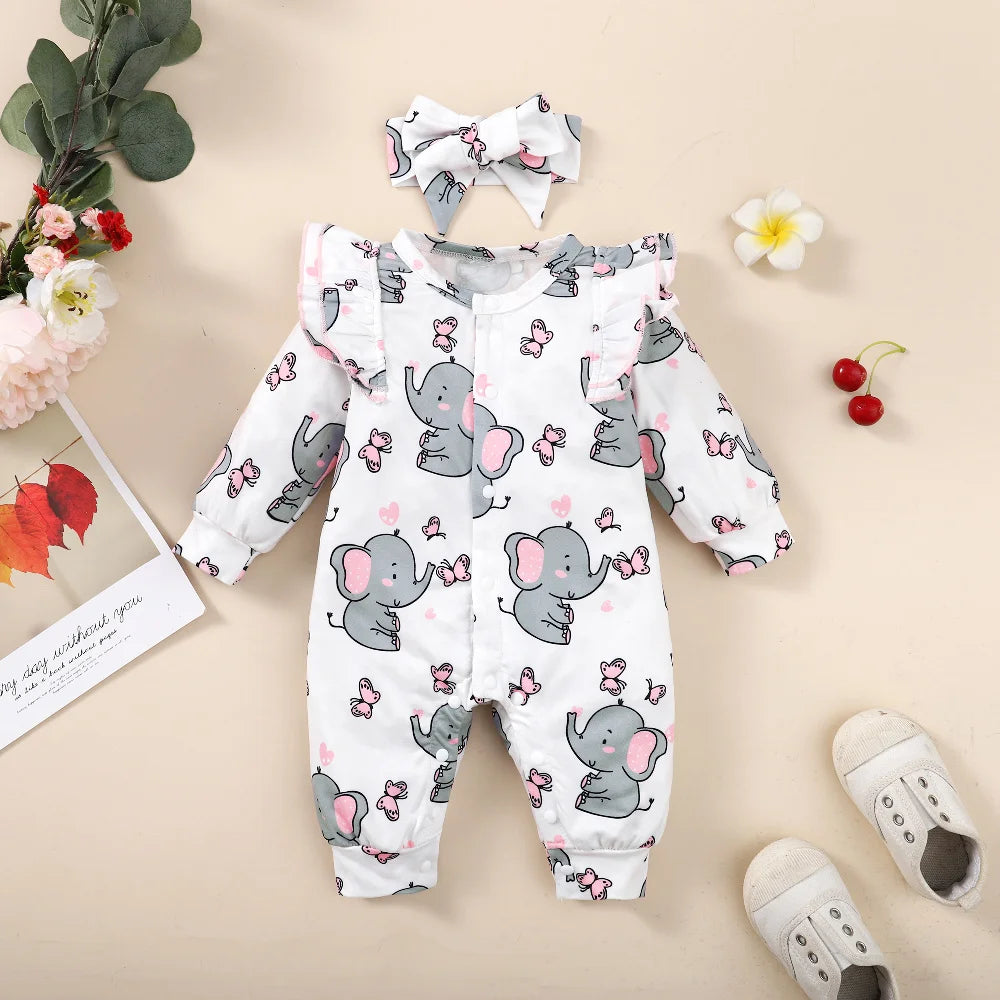 Adorable Elephant Print Elephant Dreams Romper with cute print, long sleeves, and matching headband for baby girls 0-18M, surrounded by flowers and shoes.