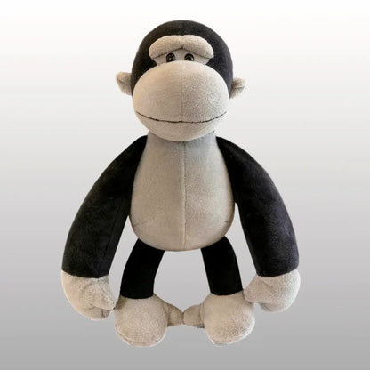 Plush monkey doll from Jungle Friends collection, perfect for imaginative play and snuggles. Soft, huggable, and durable stuffed toy.