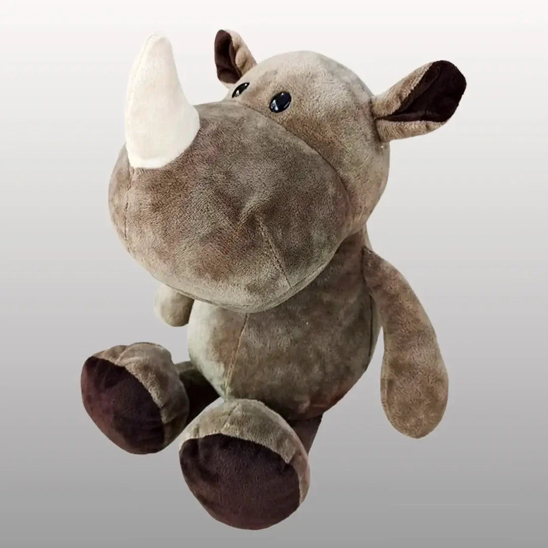 Rhino plush doll from Jungle Friends collection, featuring soft, huggable material perfect for kids’ playtime and snuggles.