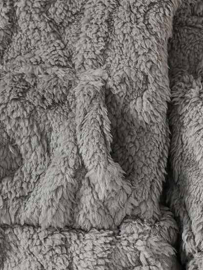 Close-up of fuzzy gray fabric from Cloud-Soft Knit Hoodie & Joggers Set, showing the soft texture for baby and toddler comfort.