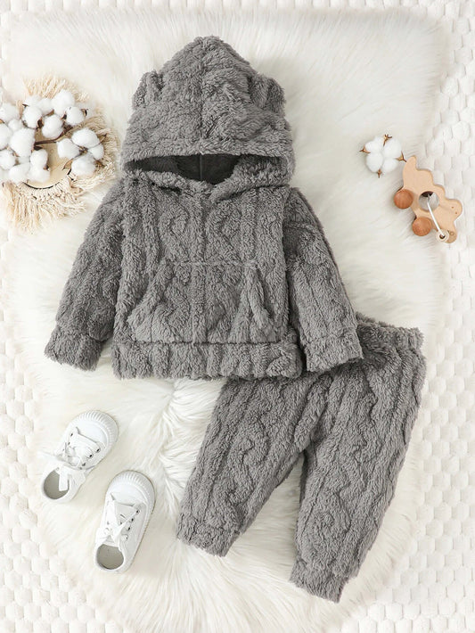 Cozy gray Cloud-Soft Knit Hoodie and Joggers Set for toddlers, paired with white shoes, perfect for cool weather days.