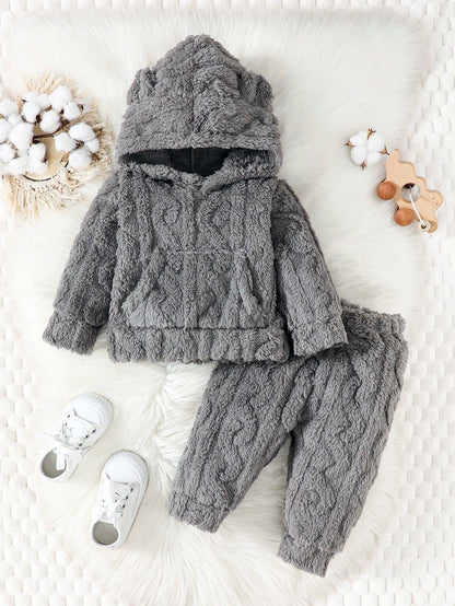 Cozy gray knit hoodie and joggers set for toddlers, perfect for cool weather. Matching baby outfit includes elastic waist pants and fuzzy hooded top.