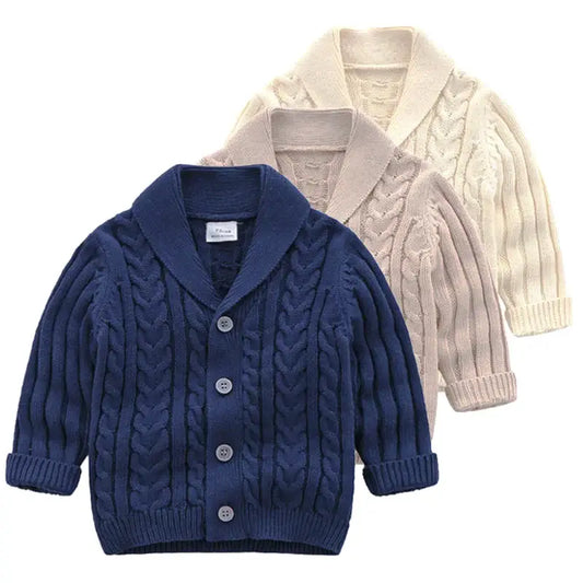 Knit cardigans for baby boys in navy and cream colors, featuring stylish cable design, suitable for ages 3M to 3T.