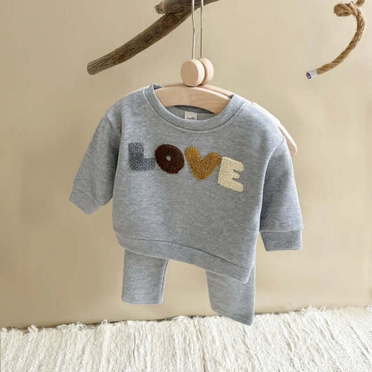 Organic cotton toddler sweatshirt and pants set with LOVE design, perfect for spring and autumn.