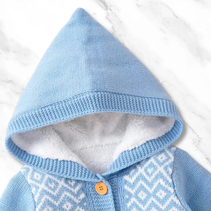 Baby blue Nordic knit hooded romper with warm fleece lining, perfect for chilly days. Cozy, charming, and stylish for 0-18M infants.