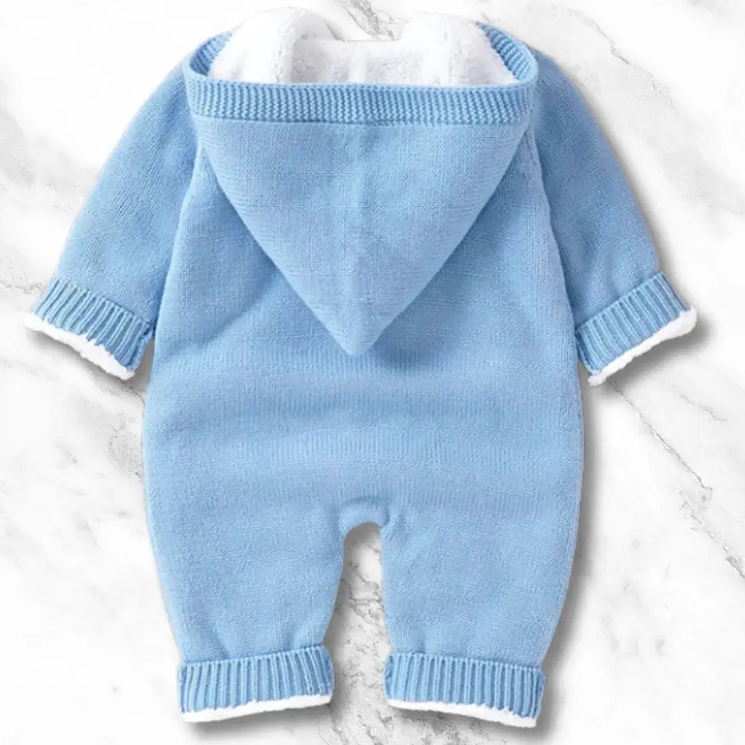 Baby blue Nordic knit hooded romper with cozy fleece lining, perfect for warmth and style for babies aged 0-18 months.