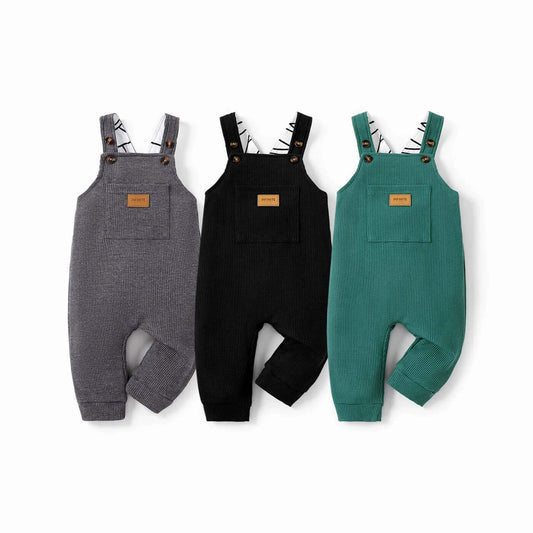 Cozy Austin Overalls for babies in waffle fabric featuring front pockets and stylish design in gray, black, and green colors (3-24M).