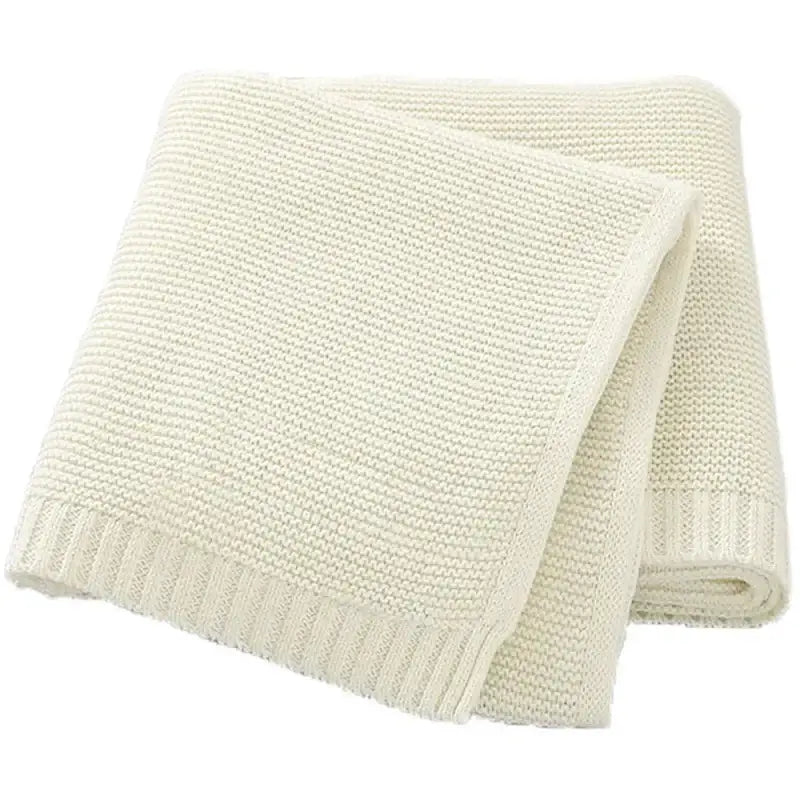 Cozy 100% cotton personalized baby blanket in soft cream, perfect for nurseries and gifts.