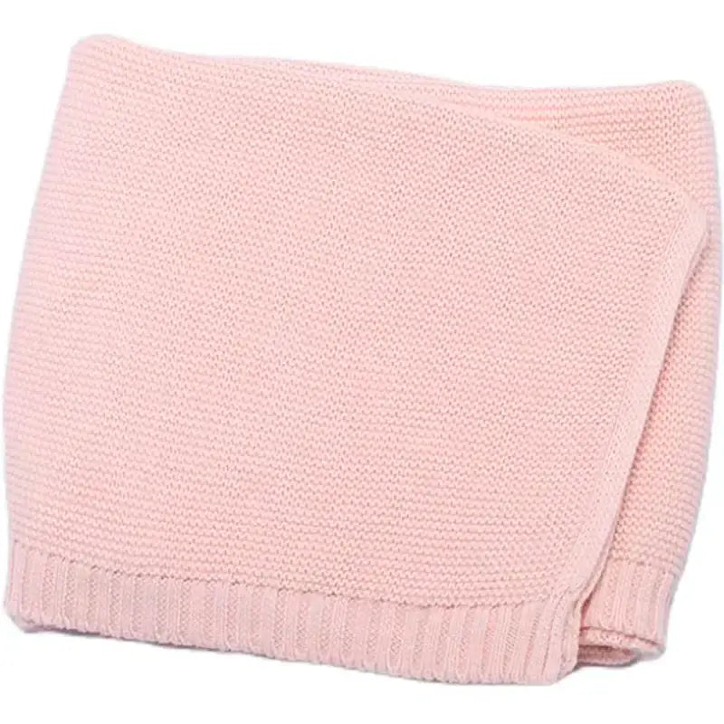 Soft pink handwoven baby blanket, 100% cotton, perfect for cozying up little ones or personalizing as a unique gift.