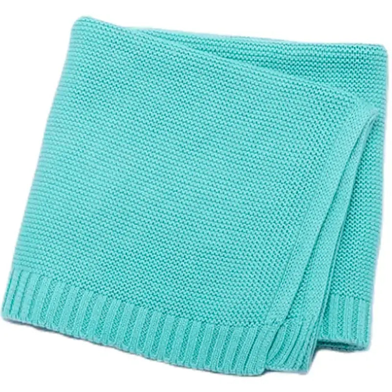 Cozy turquoise 100% cotton baby blanket, perfect for personalization and keeping little ones warm and snug.