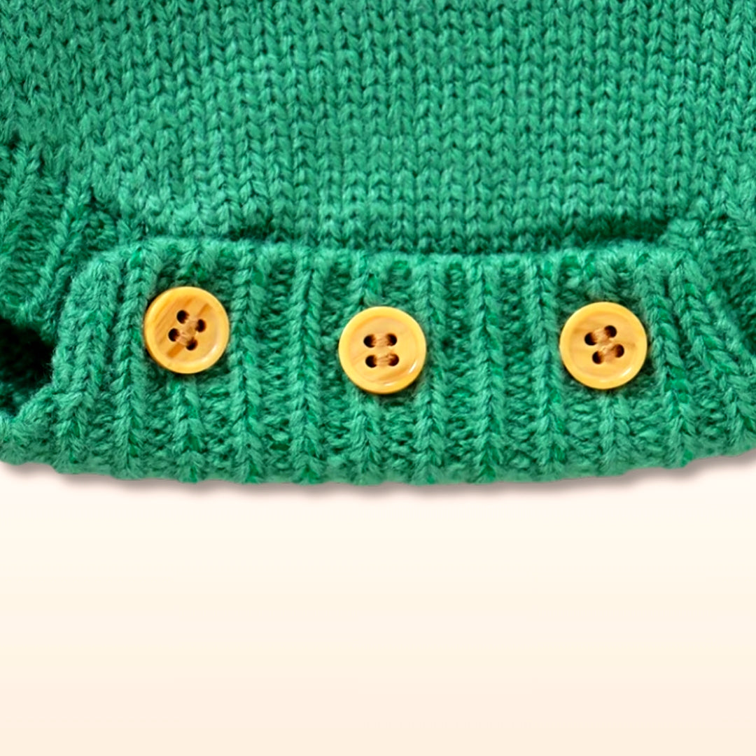 Green knit romper with three yellow buttons, part of the Playful Pup collection for babies 0-18 months.