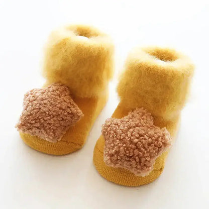 Ultra-soft anti-slip baby socks in yellow with fluffy stars, perfect for warmth and comfort for newborns and toddlers.