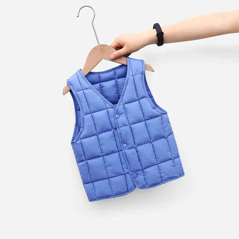 Cozy Chill-Proof Puffy Vest in solid blue, perfect unisex outerwear for kids aged 1-8, keeping them warm and stylish in cool weather.