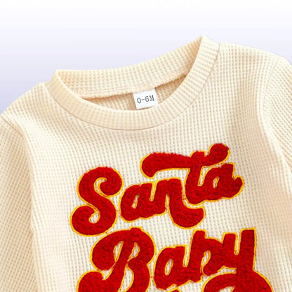 Close-up of Santa Baby Christmas waffle sweatshirt with red embroidered letters, size 0-6 months. Cozy and festive baby wear.