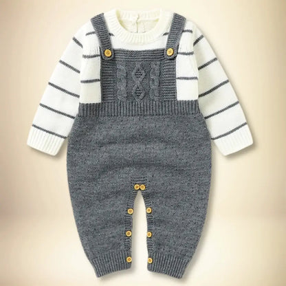 Baby knit suspender set with striped sweater and button details, perfect for a cozy day or family gathering.