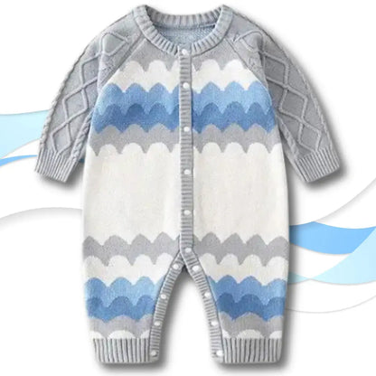 Sky Waves Knit Romper in blue, white, and grey featuring a cozy front snap-button closure for easy dressing.