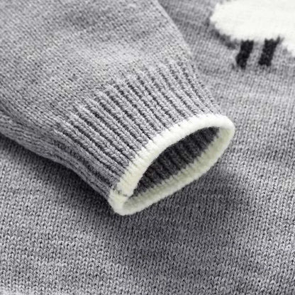 Close-up of gray knit sweater sleeve from Snuggly Little Lamb set with sheep embroidery, showcasing soft, cozy fabric.