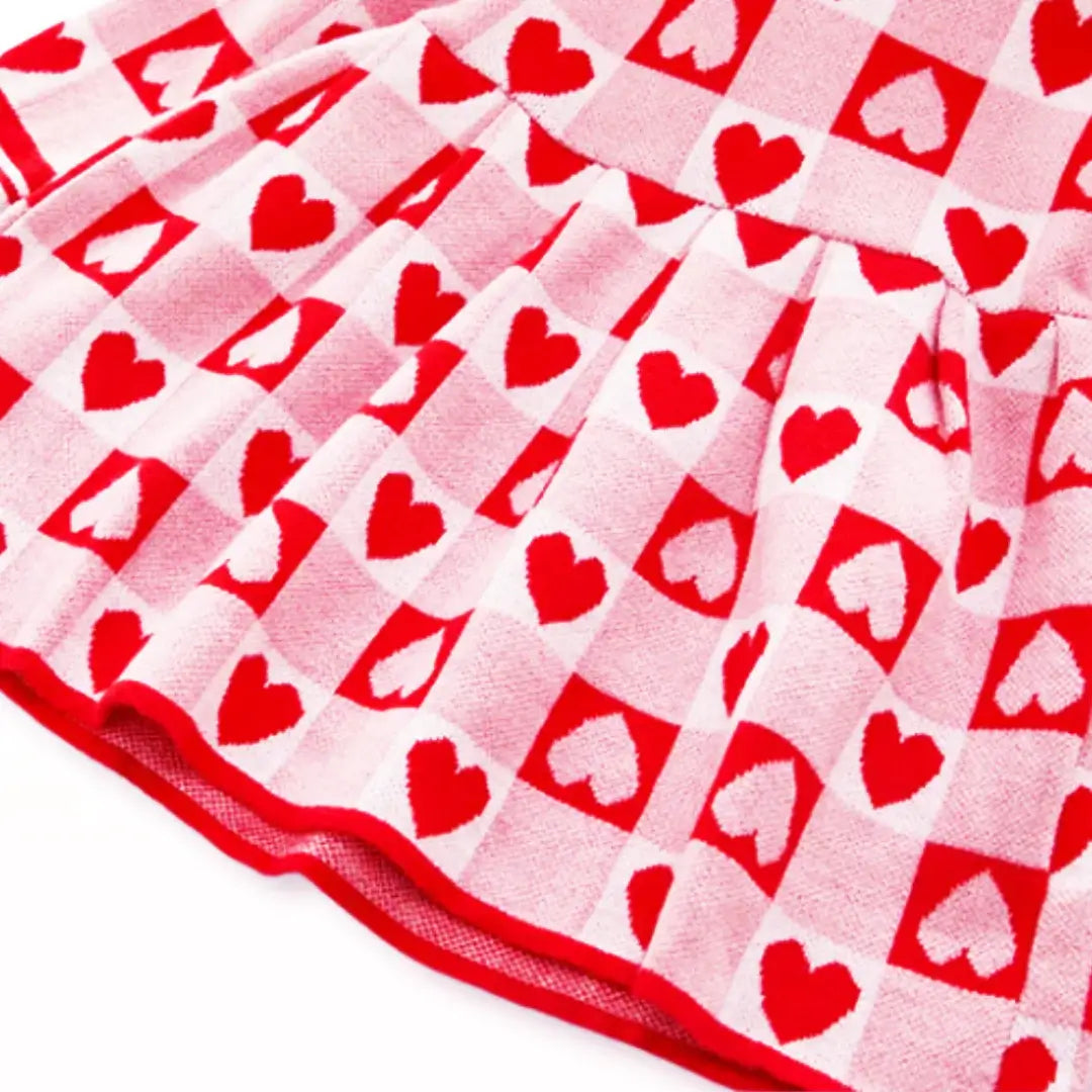 Red and pink heart-patterned knitted fabric for Sweetheart Baby Sweater Dress, perfect for toddlers aged 2T-6Y.