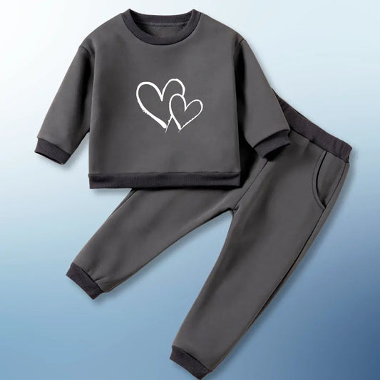 Cozy toddler sweatshirt and joggers set with double heart design, perfect for playtime. Soft fabric, available in multiple colors.