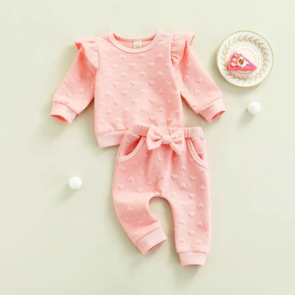 Vienna Love Ruffle Set with charming heart prints and ruffled long sleeves, perfect for babies 3-24M.