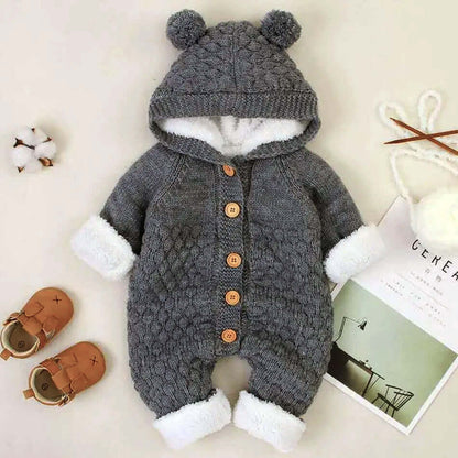 Cozy cashmere knit hooded romper for babies, perfect for autumn and winter, featuring a soft cardigan-style design with a snug hood.